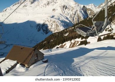 Andermatt Ski Slopes With Blue Sky, Switzerland