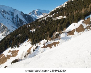 Andermatt Ski Slopes With Blue Sky, Switzerland