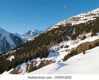 Andermatt Ski Slopes With Blue Sky, Switzerland