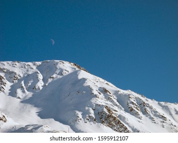 Andermatt Ski Slopes With Blue Sky, Switzerland