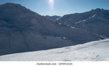 Andermatt Ski Slopes With Blue Sky, Switzerland