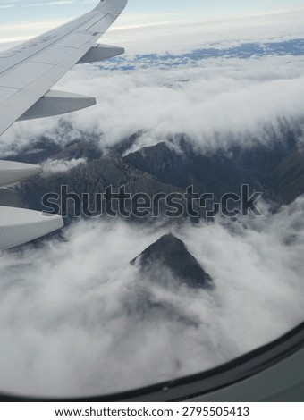 Andes mountais range from top clouds 