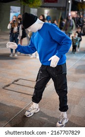 Andorra, Andorra; December 20, 2021: Street Dancer At The Neighborhood Parties. He Goes With His Face Covered