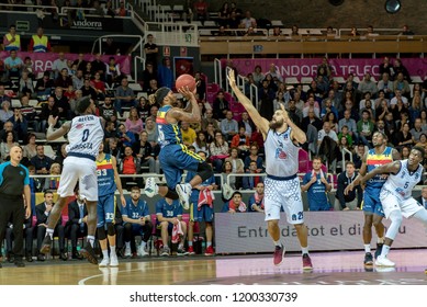 ANDORRA LA VELLA, ANDORRA - OCTOBER 10 2018: Andrew Albicy De Mora Banc Andorra Attacks Bryon Allen's Defense Of The Germani Brescia Leonessa In The  EURO CUP Game