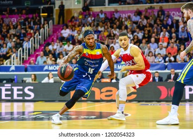 ANDORRA LA VELLA, ANDORRA - OCTOBER 13 2018: The French Base Of The Mora Banc Andorra Andrew Albicy Passes The Mark Of Gabriel Lundberg Of The Baxi Manresa. LIGA ENDESA ACB Game 