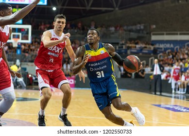 ANDORRA LA VELLA, ANDORRA - OCTOBER 13 2018: Dylan Ennis Player Of  Mora Banc Andorra Andrew Albicy Attacks With The Ball For Mora Banc Andorra LIGA ENDESA ACB Game