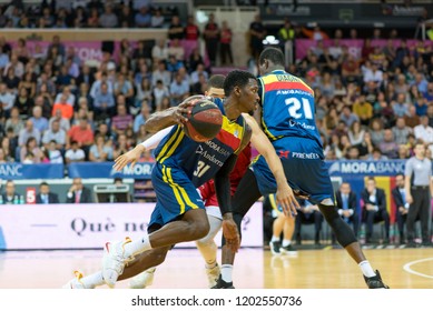 ANDORRA LA VELLA, ANDORRA - OCTOBER 13 2018: Dylan Ennis Player Of  Mora Banc Andorra Andrew Albicy Attacks With The Ball For Mora Banc Andorra LIGA ENDESA ACB Game