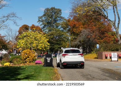 Andover, MA, US-October 27, 2022:  Car Dropping Off Ballot At Outdoor Ballot Drop Box Outside Of Election Polling Place.