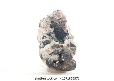 andradite dark crystal mineral sample in quartz and granite - Shutterstock ID 1871956576