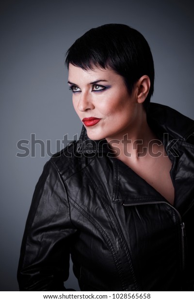 Androgyne Brunette Woman Dressed Leather Jacket Stock Image