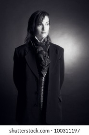 Androgynous. Portrait Of Young Woman In Men's Suit.