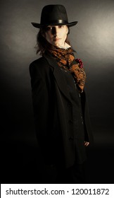 Androgynous. Portrait Of Young Woman In Men's Suit.