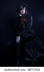 Androgynous. Portrait Of Young Woman In Men's Suit.