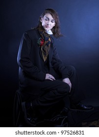 Androgynous. Portrait Of Young Woman In Men's Suit.