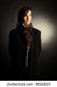 Androgynous. Portrait Of Young Woman In Men's Suit.