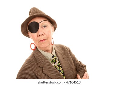 Androgynous Senior Woman With Eye Patch In Tweed