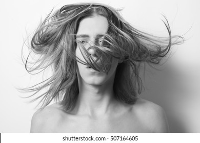 Androgyny Young Man. Close Up Portrait. Windy Hair