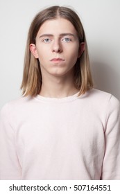 Androgyny Young Man With Pink Sweater