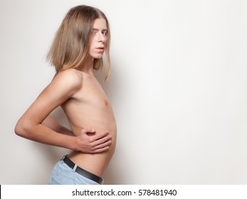 Androgyny Young Man Topless Posing On White Background