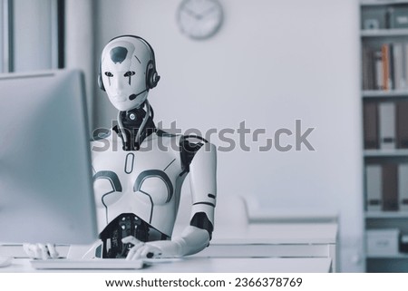 Android AI robot sitting at the desk and working in the office: artificial intelligence, business and automation concept
