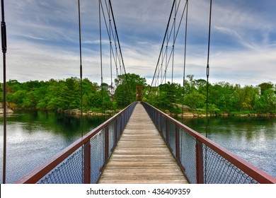 The Androscoggin Swinging Bridge is a pedestrian suspension bridge spanning the Androscoggin River between the Topsham Heights neighborhood of Topsham, Maine and neighboring Brunswick.