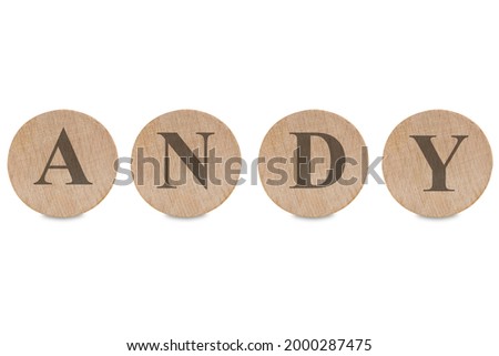 Andy word written on wood block isolated in white. Andy text on wooden block for your desing, concept. Andy name