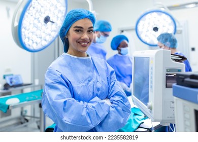 Anesthesiologist keeping track of vital functions of the body during cardiac surgery. Surgeon looking at medical monitor during surgery. Doctor checking monitor for patient health status. - Powered by Shutterstock