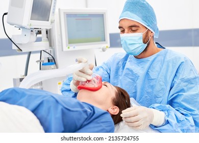 Anesthetist takes care of anesthesia and ventilation for the patient during the operation - Shutterstock ID 2135724755