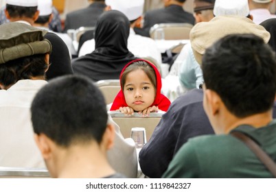 ANG THONG, THAILAND - 23 JUNE 2018 : Muslim woman child looking camera in meeting room - Shutterstock ID 1119842327