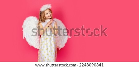 Angel child banner, isolated studio background. Beautiful little angel girl, isolated on red. Sweet angel princess children.