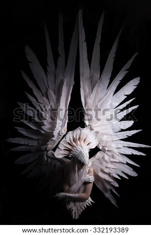 Angel, costume, concept, cinematic, young girl with white wig , which carries a large white mask and a large white wings. feathers costume and hands painted in white, dramatic , thoughtfull