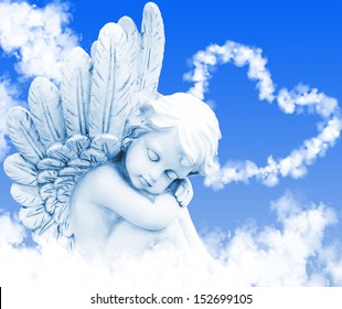 Angel dreams before heart from clouds