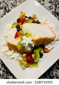 Angel Food Cake With Kiwi, Strawberries And Blueberries 