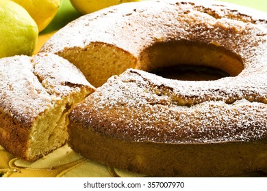 Angel Food Cake Sliced And Lemons