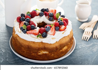 Angel Food Cake With Whipped Cream And Fresh Berries