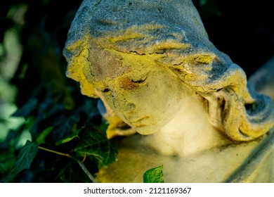 Angel. Fragment Of An Ancient Statue. Close Up. Horizontal Image.