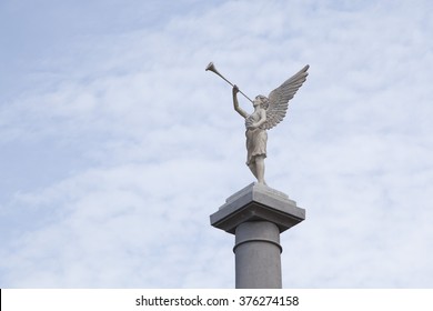 Angel Sculpture Blow Horn On Tower