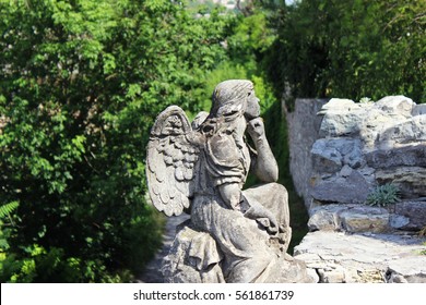 Angel Statue In A Cemetery, Monument