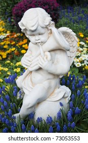 Angel Statue With Flowers