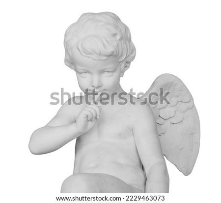 Angel statue isolated on white background. White stone sculpture of praying cherub isolated photo with clipping path