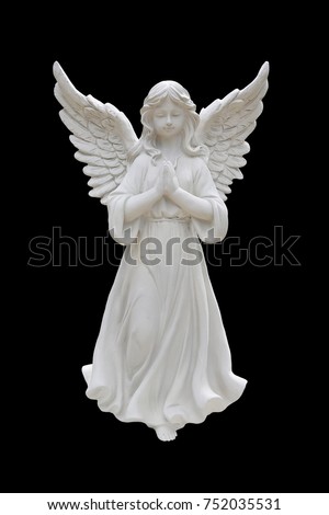 Angel statues isolated on black background.