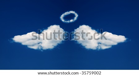 Angel wings and nimbus formed from beautiful fluffy clouds