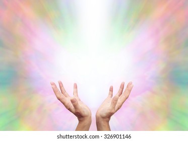 Angelic Energy Healer - Female Energy Worker With Hands Outstretched And Open Upwards Sensing Healing Energy On Ethereal Rainbow Colored  Energy Formation Background