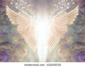 Angelic Light Being - Pair Of Angel Wings With Bright White Light Between And A Stream Of Glittering Sparkles Flowing Upwards Against An Ethereal Gaseous Energy Formation Background 
