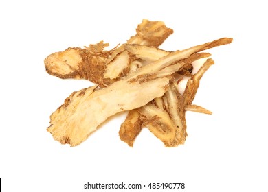 Angelica root used in chinese traditional herbal medicine, over white background. Radix angelicae sinensis, Dang gui.