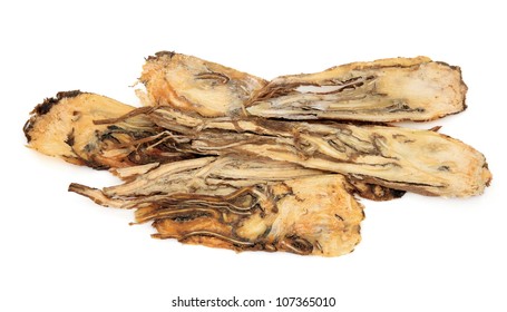 Angelica root used in traditional chinese herbal medicine  over white background.