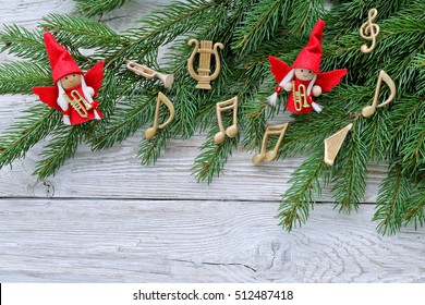 Angels With Instruments, Music Notes , Christmas Tree On Wooden Background 