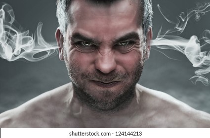 Anger, Close Up Of Angry Man With Smoke Coming Out From His Ears