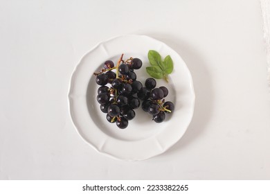 Anggur bali or bali grapes on white background. Selective focus