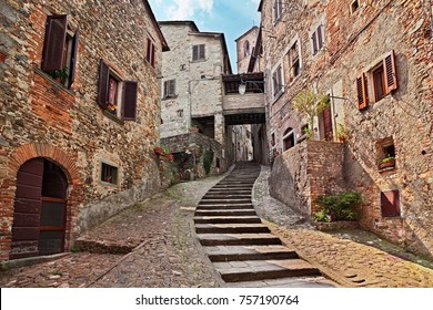 Anghiari, Arezzo, Tuscany, Italy: picturesque old narrow alley with staircase in the medieval village

